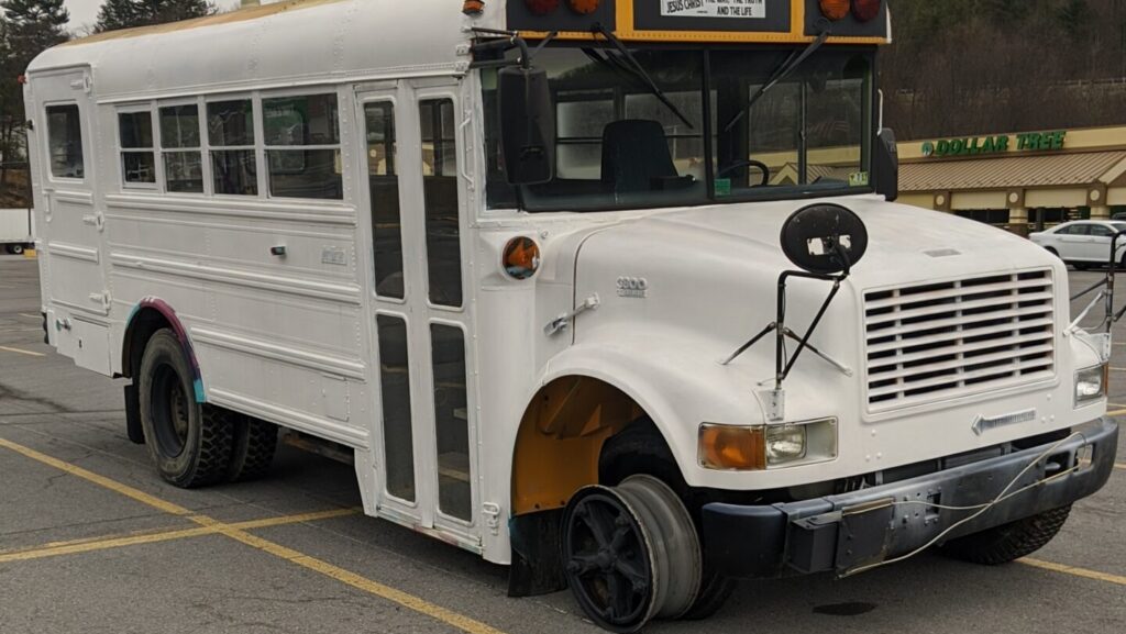 School Bus with Blown Tire. We Bought a Skoolie then Broke it Immediately.